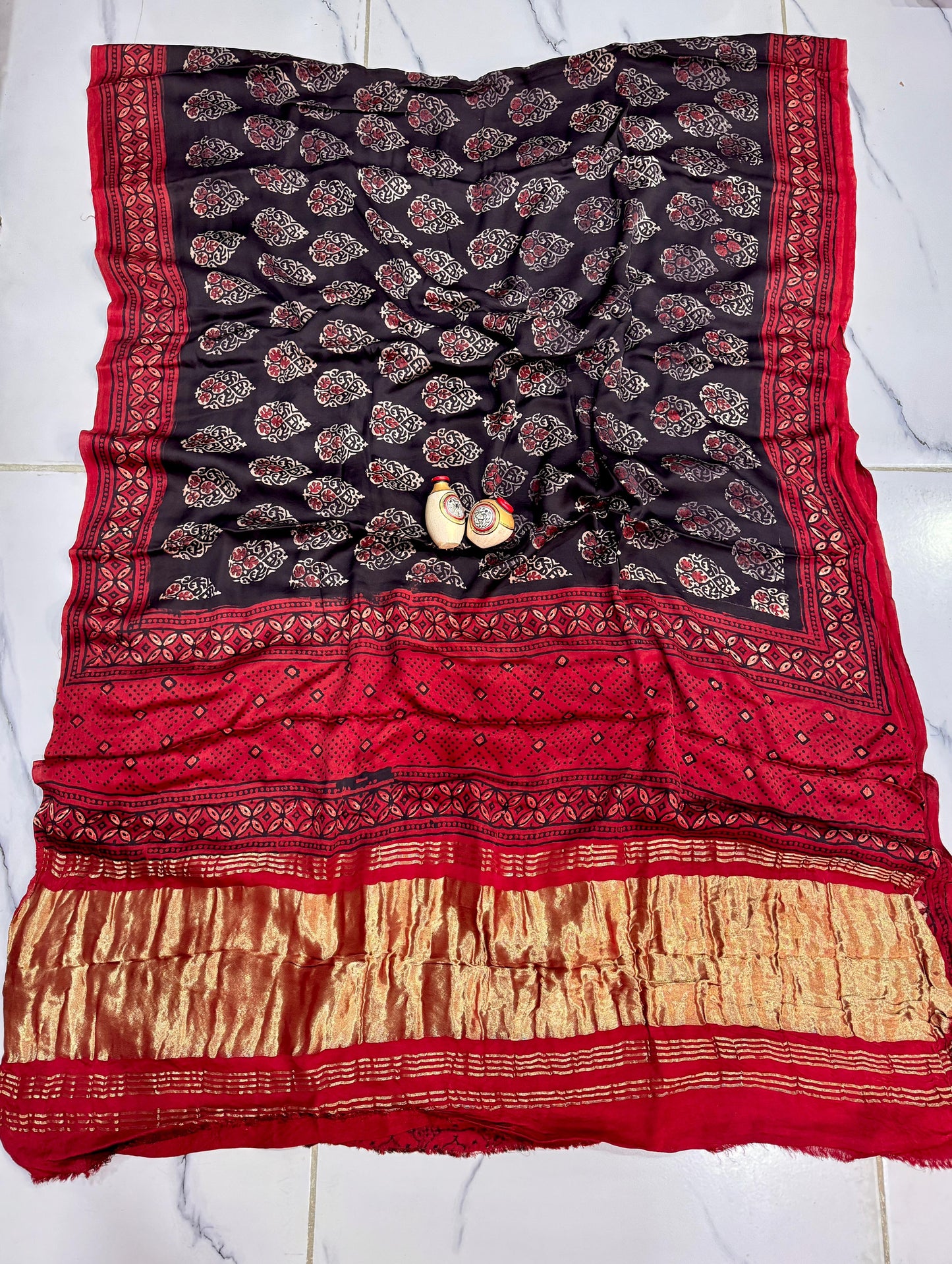 “Saanjh – Ajrakh Modal Saree with Antique Gold Tissue & Red Accents”